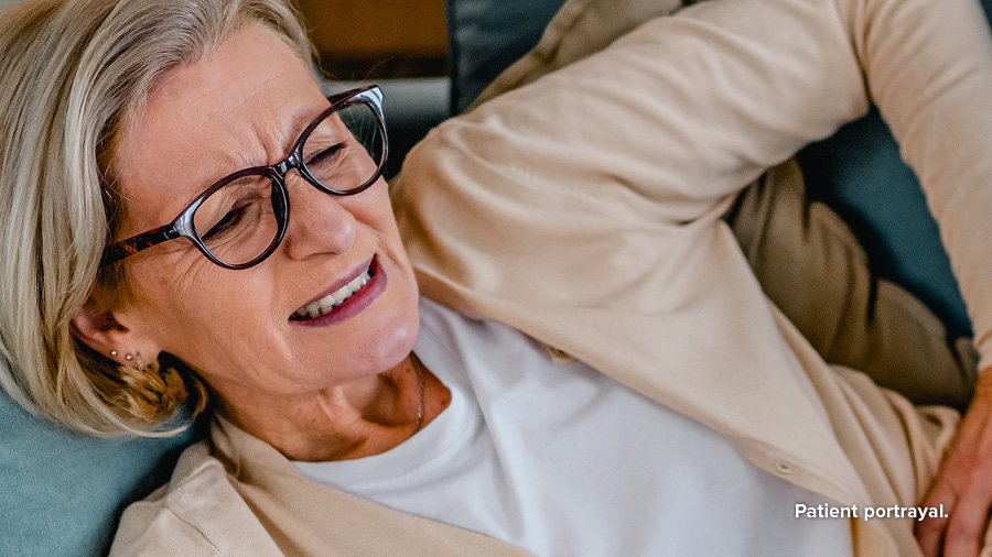 Woman suffering from postherpetic neuralgia