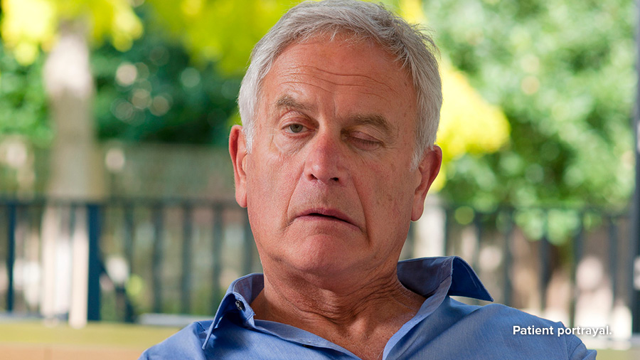 Man experiencing facial drooping caused by stroke